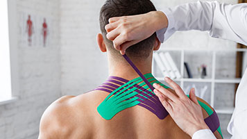patient getting kinesio taping in Oklahoma City OK