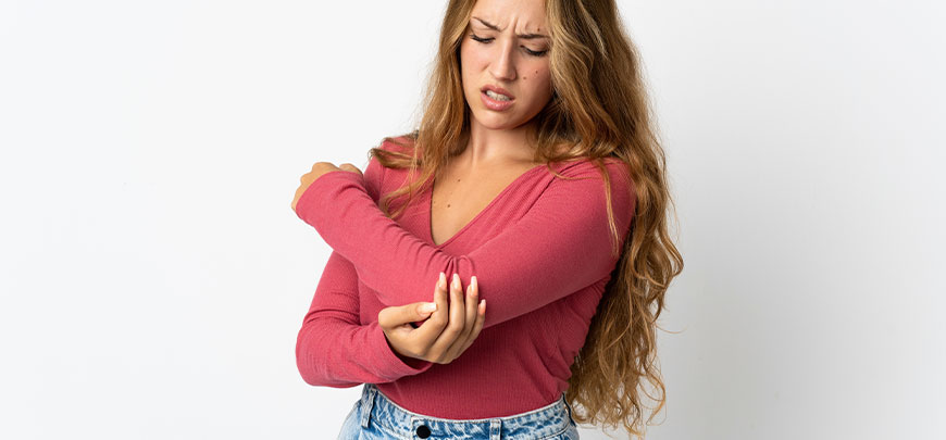 patient needing elbow pain treatment in Oklahoma City