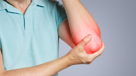 patient requiring golfer's elbow treatment in Oklahoma City